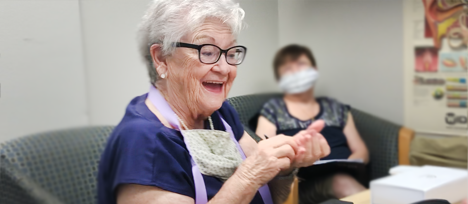 woman hearing aid happy - box header